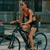 Active woman riding a bicycle
