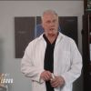 Elderly man in laboratory coat indoors